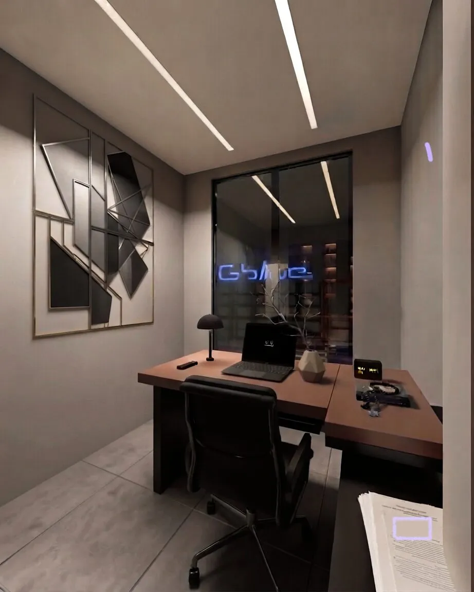 Manager's office with a dark desk, linear ceiling lights and a graphic feature wall.